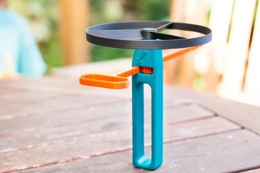 Flying Propeller Pull Copter Toy - Fun Outdoor & Indoor Aerial Spinner for Kids