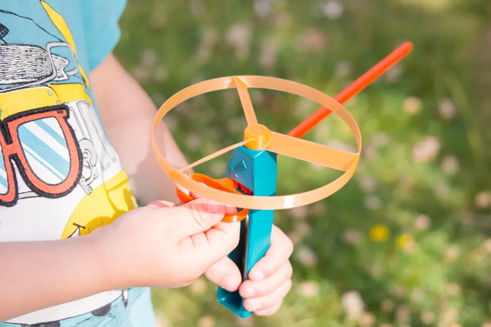 Flying Propeller Pull Copter Toy - Fun Outdoor & Indoor Aerial Spinner for Kids
